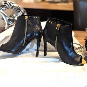 Tom Ford black and gold booties